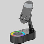 Phone stand with bluetooth speaker