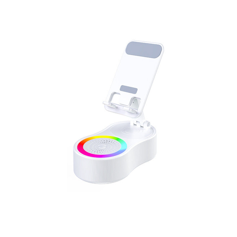 Cell phone stand with speaker